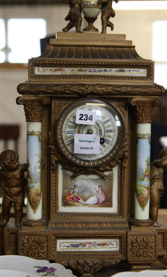 Louis XV style gilt metal and Sevres style porcelain clock